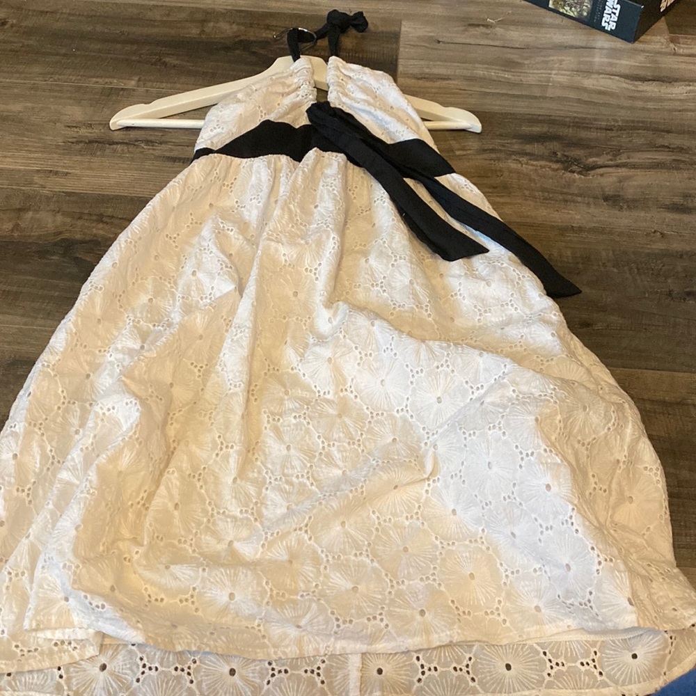 Around the neck tie White dress w/lace.